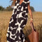 Elena - Vestido sin mangas con estampado geométrico irregular