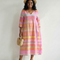 Tessa | Vestido midi de rayas con drapeado suave