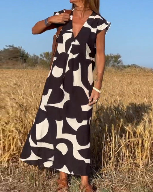 Elena - Vestido sin mangas con estampado geométrico irregular