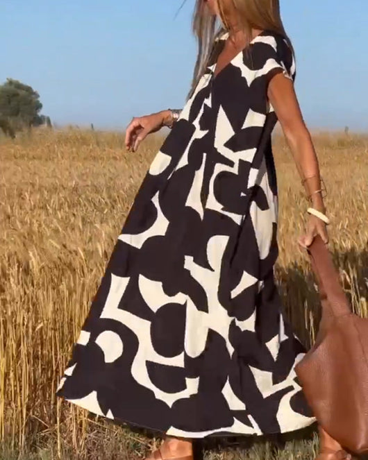 Elena - Vestido sin mangas con estampado geométrico irregular