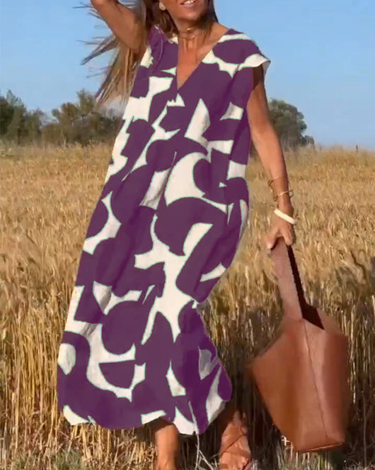 Elena - Vestido sin mangas con estampado geométrico irregular
