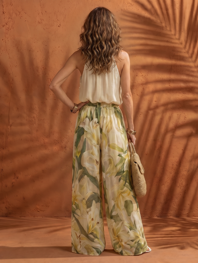 Solange | Conjunto de blusa de cuello halter y pantalón de pierna ancha con estampado floral