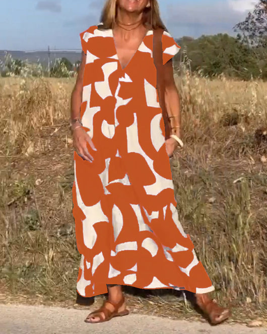 Elena - Vestido sin mangas con estampado geométrico irregular