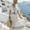 Miriam | Vestido midi de manga corta con escote en V y estilo envolvente