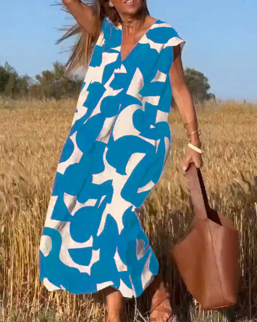 Elena - Vestido sin mangas con estampado geométrico irregular