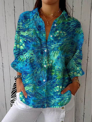 Patricia – Blusa azul con estampado natural
